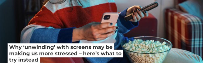 Using multiple digital devices at once can be highly distracting and overstimulating. Riska/E+ via Getty Images